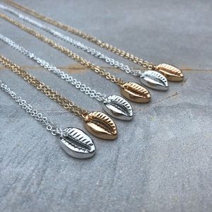 Silver Tone Cowrie Shell Pendant Necklace